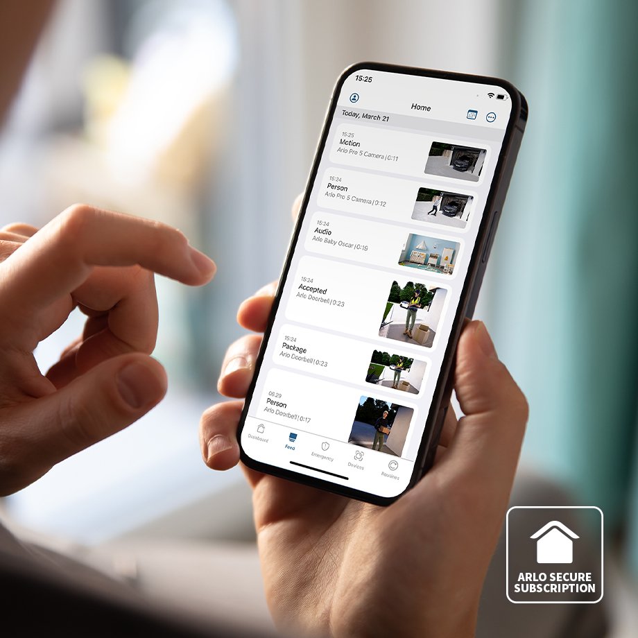 A person using Arlo Secure's cloud storage to watch saved videos.